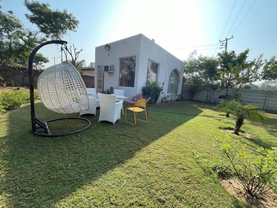 Gurugram House | Adorable bedroom and living room with pool