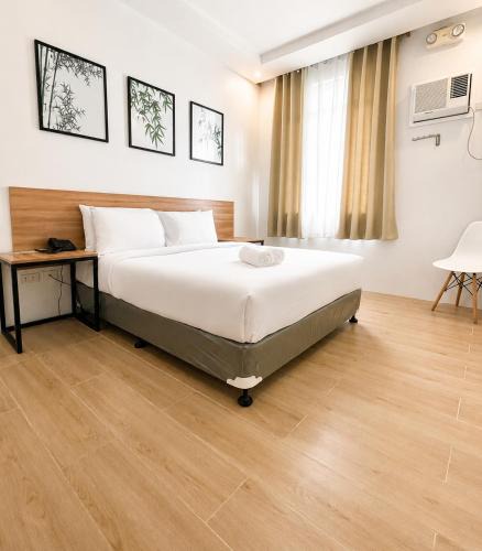 Puerto Princesa City Centre Hotel | Bambu Suites