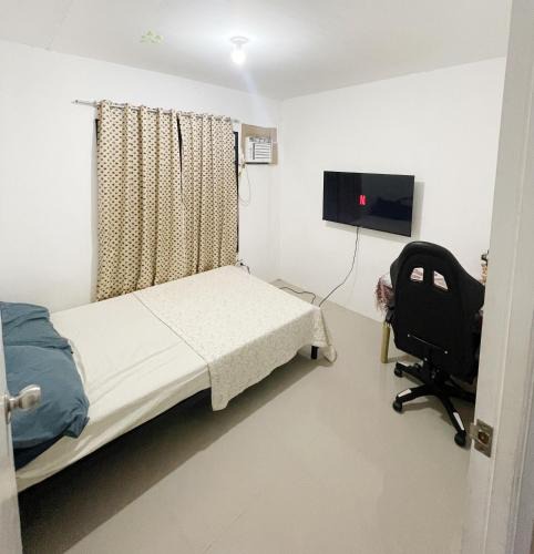 Magalang Hotel | Cozy 2-bedroom family house near Clark & Angeles city
