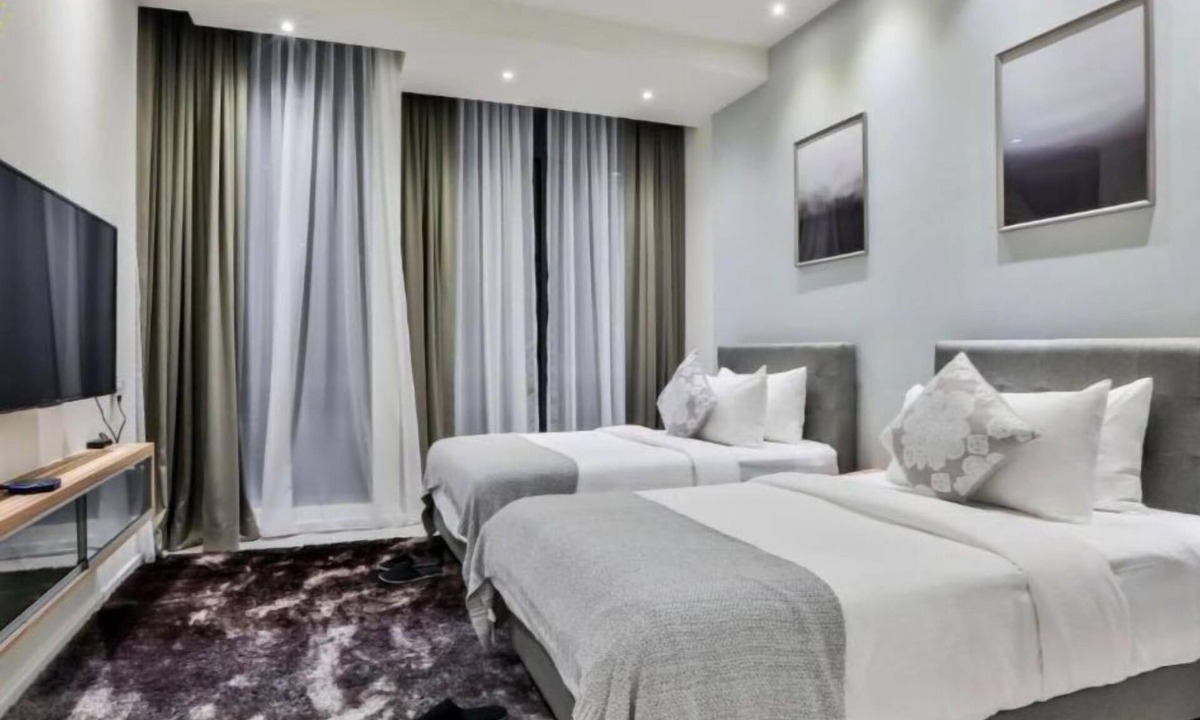 Malaysian Police Training Centre Apartment | Deluxe King Suite with Twin Tower View 1