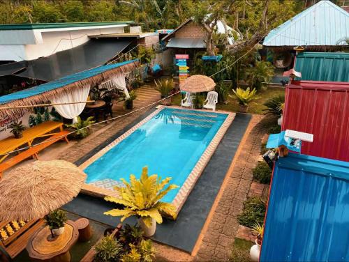Poro Resort | La Provinzia Exclusive Use - 3 Air-Conditioned Rooms 3 Fan Cooled Huts Good for 12 People