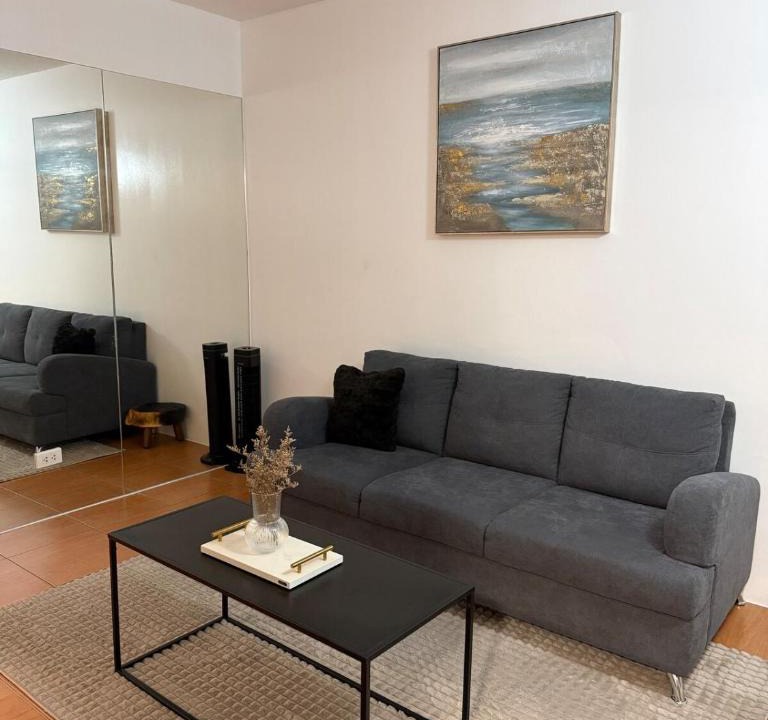 Moonwalk Apartment | Modern lounge 2BR Pool & Netflix Near airport