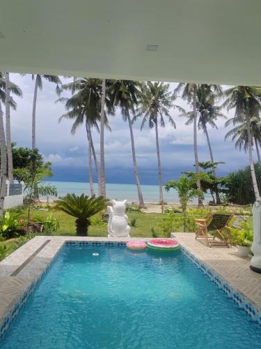 Roxas Villa | PRIVATE VILLA FRONT BEACH Infinity Pool