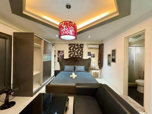 Balibago Apartment | Sheryll Escapes - Kandi comfortable studio with fast WiFi & free housekeeping