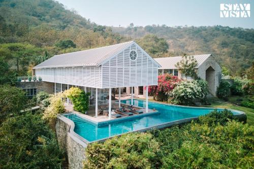 Alibaug Villa | StayVista at The Ray with Mountain Views, BBQ, AC