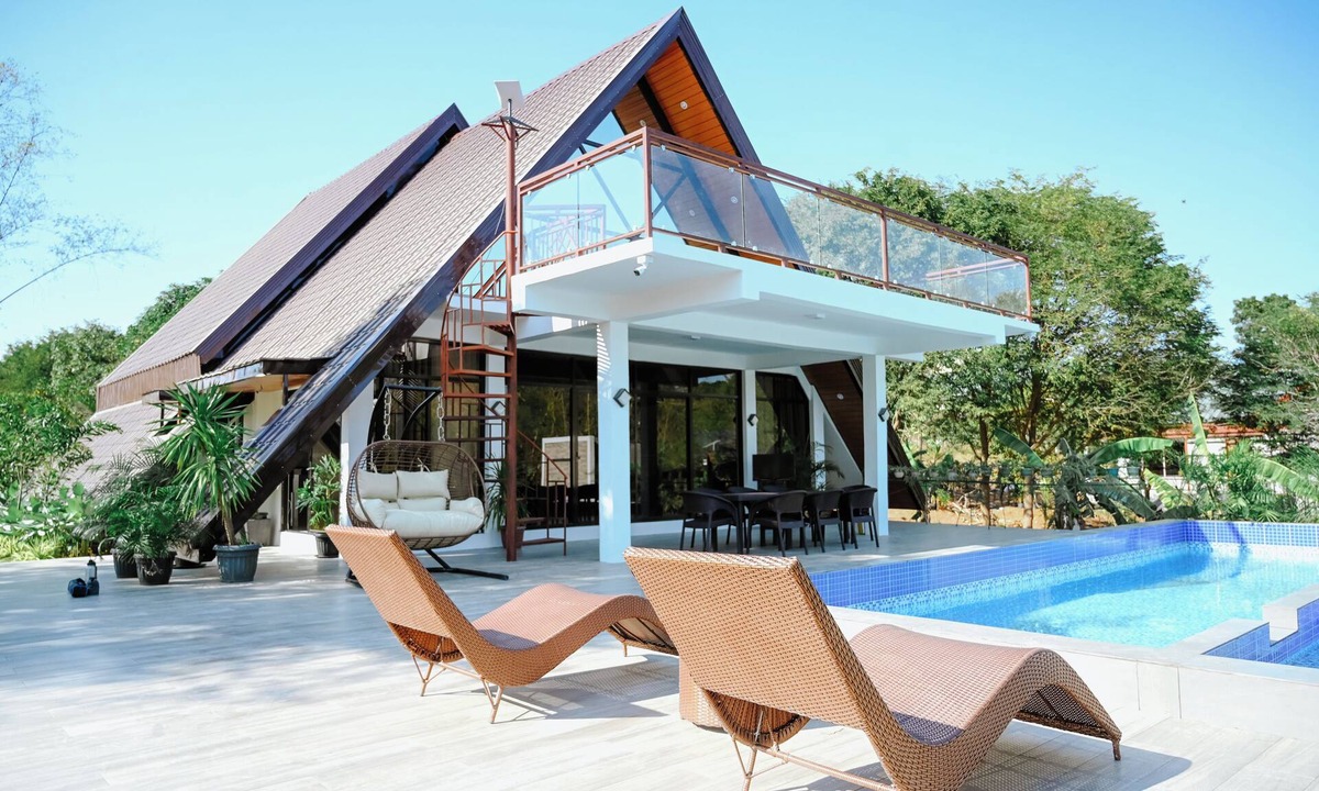 Balingasay Cabin | Step into an A-Frame home, where white tropical design meets ultimate comfort.
