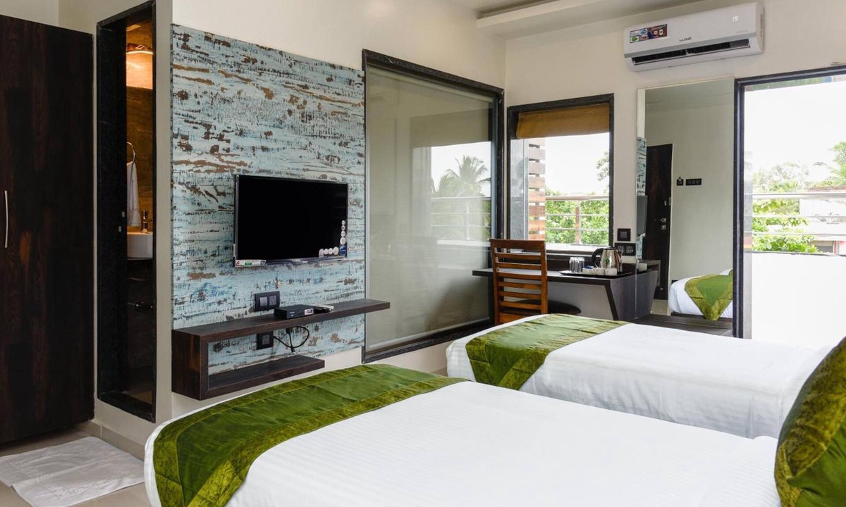 Nigdi Hotel | Treebo Malhaar Regency