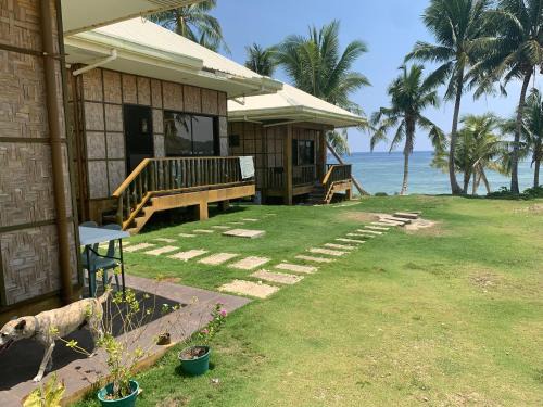 Burgos Villa | Villa Malinao Oceanview Resort - Deluxe bungalow