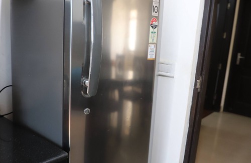 Noida Apartment | Charming 2-bedroom apartment with WiFi, AC in enchanting Noida, Free Parking