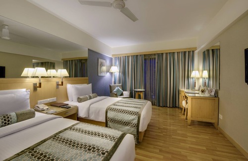 Satellite Hotel | Pride Plaza Hotel, Ahmedabad