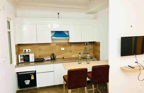 Noida Apartment | Square by Noida Studios