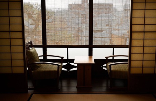 Gion House | The room is a special maisonettetype room with a private garden and a cypress bathtub The room is /Kyoto Kyōto