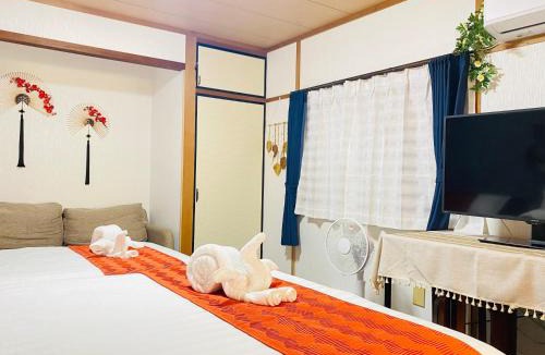 Shin-Osaka Apartment | 大阪民宿梅田淀川花b套