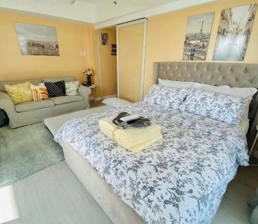 San Fernando Apartment | 1BR-MonteCarloBliss by The Bali Corner at Azure North, 25th Floor, Full view of Beach Resort Amenities