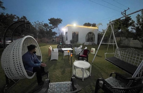 Gurugram House | Adorable bedroom and living room with pool
