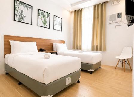 Puerto Princesa City Centre Hotel | Bambu Suites