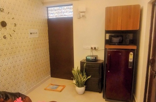 Noida Apartment | Blissful Haven - 1BHK Retreat with Bean Bag