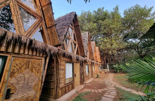 Chapora Cottage | Butterfly: Hi-Design Stylish AC Cottage in Vagatornn
