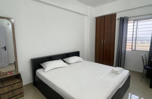Sualkuchi Apartment | Charming 2-bedroom apartment with AC, WiFi, 2mins from Guwahati Airport