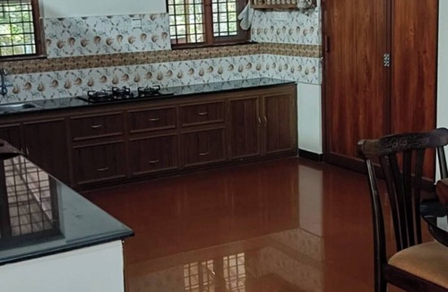 Mavelikara House | Charming 2-bedroom bungalow in Ennakkad with WiFi and AC