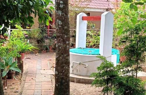 Mavelikara House | Charming 2-bedroom bungalow in Ennakkad with WiFi and AC