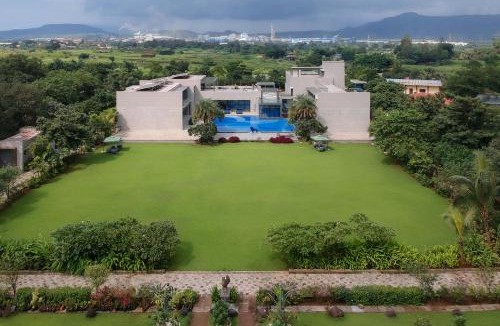 Khalapur Villa | Colossus by StayVista - Riverside luxury villa in Khalapur with a Spacious pool, Sauna, Private theater, Gazebo & Lawn