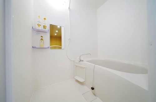 Sonezakishinchi Apartment | Cozy 6 - guest Japanese - themed stay. Great facilities. Private & comfy.