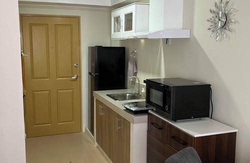 Dumaguete Apartment | Cozy condo with AC and fitness room in lovely Dumaguete steps from the Ocean