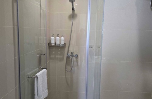 General Trias Condo | Cozy Modern 1-bedroom condo with AC in General Trias