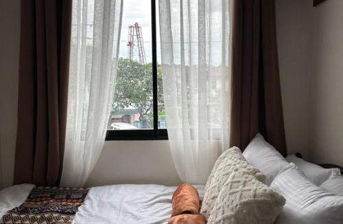 Balibago Apartment | Dainty Den LS217- Chic & Relaxing Stay Near Enchanted Kingdom