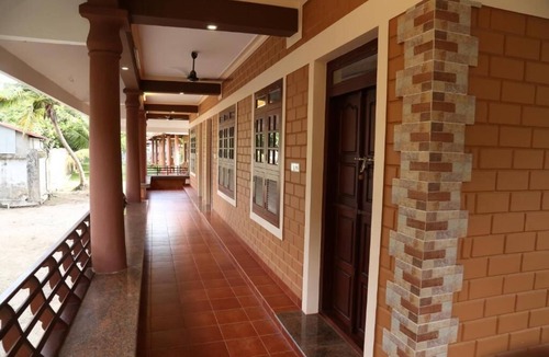 Alappuzha Bed & Breakfast | Dazzle Dew Memories - Deluxe Family Double Room