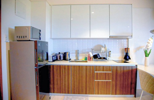 Maribago Condo | Deluxe Studio unit condo in Lapu-lapu City with WiFi, AC