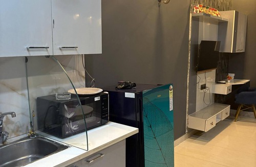 Greater Noida Apartment | Eye catching 1-bedroom apartment with WiFi, AC in serene Noida