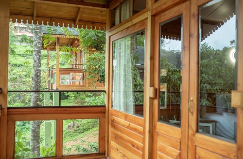 Kuttikkanam Ski Chalet | Granary Experience - Wooden Chalet in a plantation