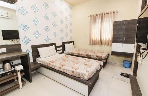 Sayajiganj Hotel | Hotel Amber Railway station