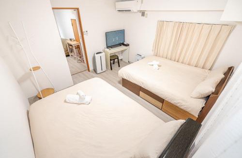 Kamiikebukuro Apartment | Ikebukuro East Exit Queen Bed Room