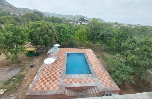 Jaipur Resort | Jhalana Retret Rooms ,Farm ,Pool, Mountain view