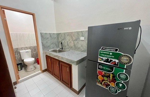 Laoag Apartment | Keep calm and feel New York!