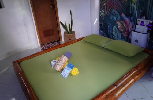 Poro Resort | La Provinzia Exclusive Use - 3 Air-Conditioned Rooms 3 Fan Cooled Huts Good for 12 People
