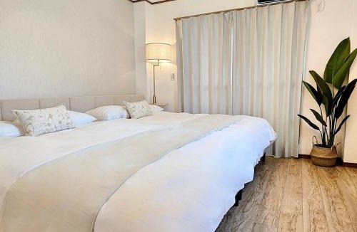 Minato House | Luna Luxury 4BR Family Villa with Parking - 2 mins from Osaka-ko Station, near EXPO, USJ, Kaiyukan
