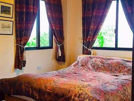Mambajao Apartment | Mccormick-Residence Gardens Resort