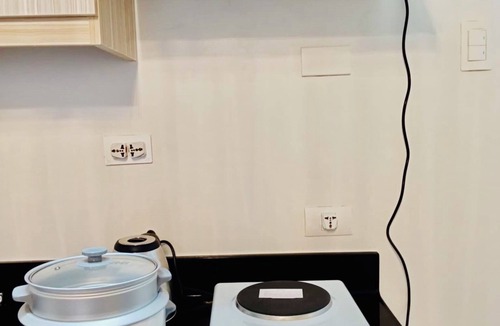 Basak Condo | “Modern 1BR Condo – Steps from Beaches & Airport”