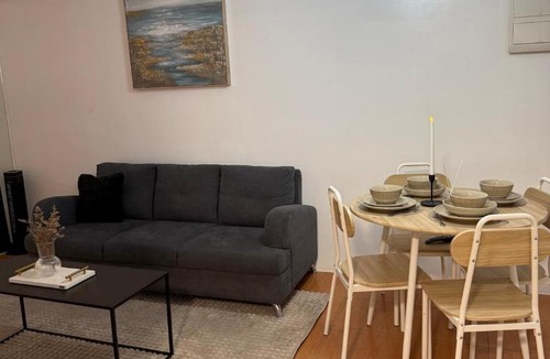 Moonwalk Apartment | Modern lounge 2BR Pool & Netflix Near airport