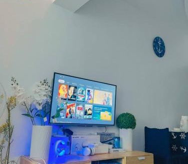 Malate Hotel | Ocean theme Navy Blue Deluxe Suite with PS4 and Balcony overlooking Manila Bay and Manila Zoo plus near Manila Yacht Club and Star City
