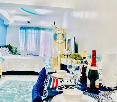 Malate Hotel | Ocean theme Navy Blue Deluxe Suite with PS4 and Balcony overlooking Manila Bay and Manila Zoo plus near Manila Yacht Club and Star City