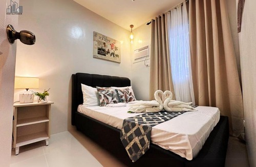 Puerto Princesa City Centre Apartment | Puerto Princesa 2BR Condo Resort style with Bunkbed, Balcony Condo Near PPC Airport up to 5pax - B2 4Kunzite
