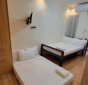 Puerto Princesa City Centre Hotel | RunwayView Traveller's Inn