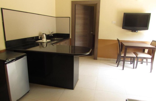 Vainguinim Hotel | Sandalwood Hotel & Suites