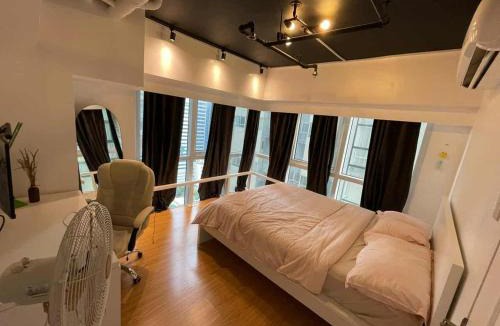 Bonifacio Global City Apartment | Spacious 1BR Loft with Flex Room in BGC