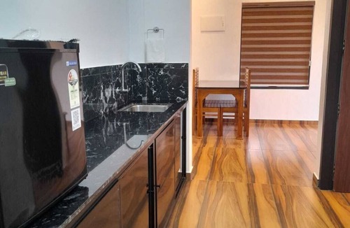 Manjoora Apartment | Spacious 4BHK in Wayanad with WiFi, AC, gym & modern amenities